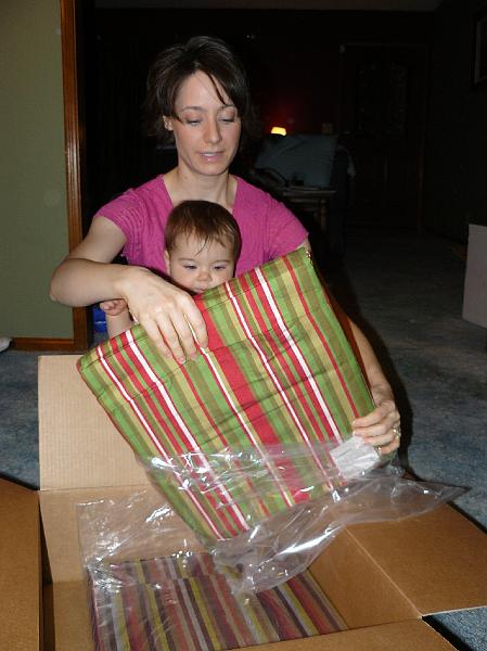 P1020517.JPG - Opening presents after dinner.