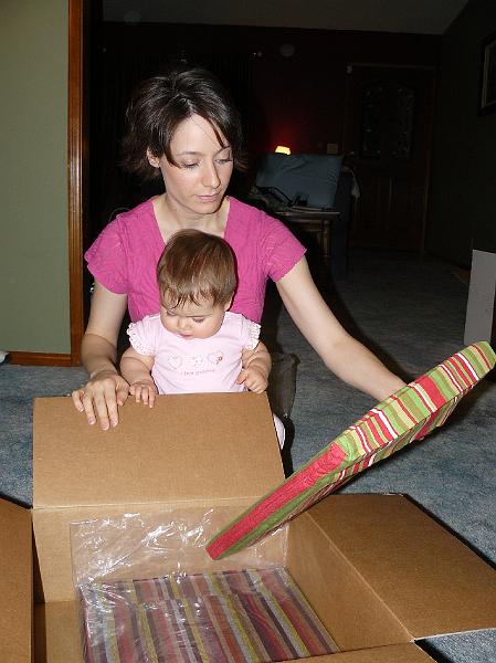 P1020519.JPG - Opening presents after dinner.