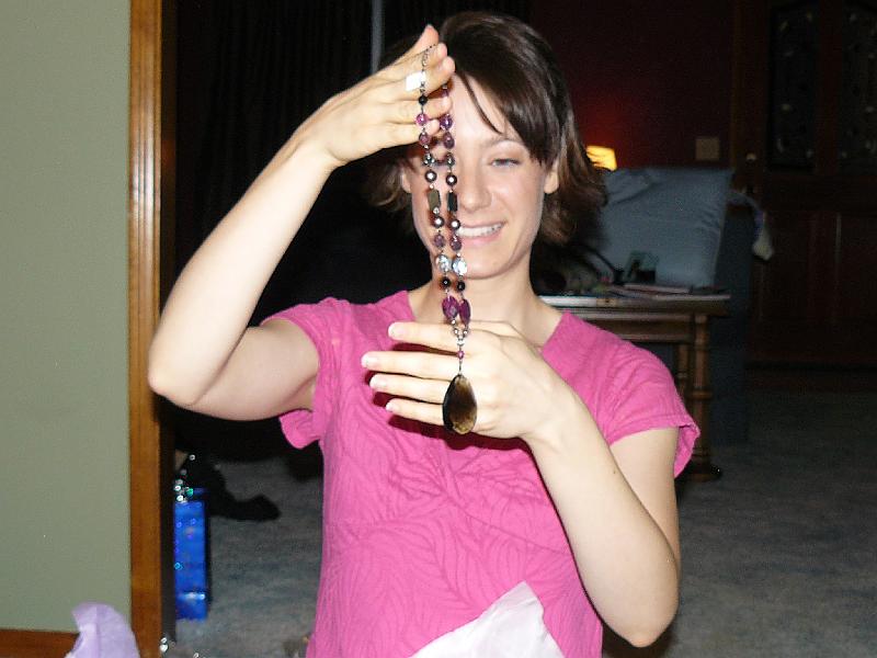 P1020528.JPG - Opening presents after dinner.