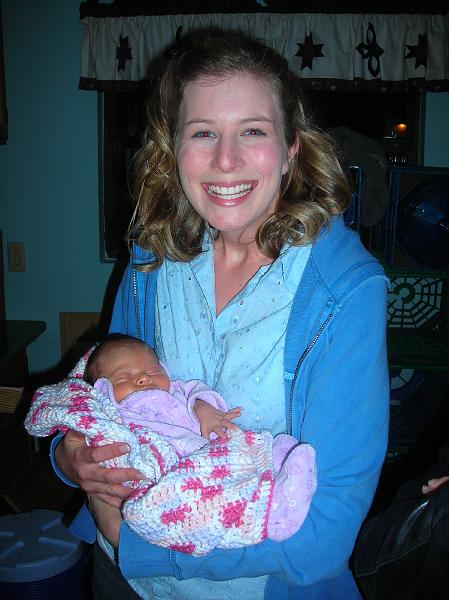 Feb1310.JPG - Amber is so excited to hold Hailee