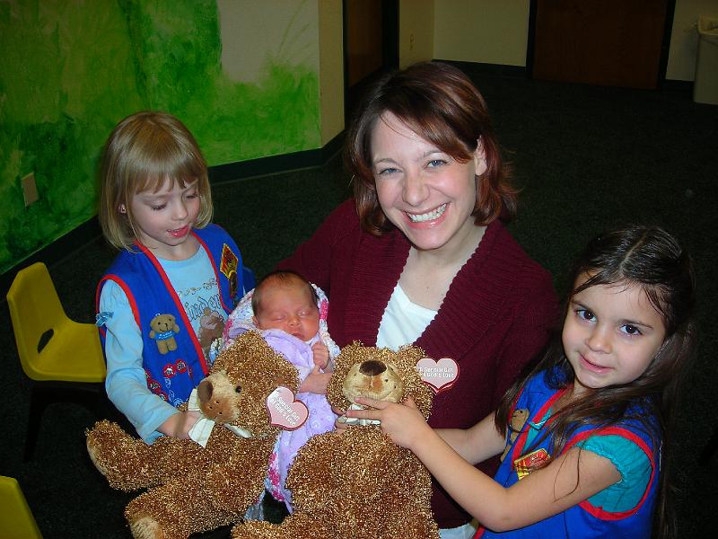 Feb1312.JPG - Little "Cubbies" are happy to pose with Hailee, showing off their Valentine gifts from their leader