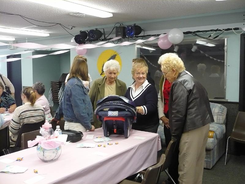 P1000338.JPG - Jody enjoys showing Kalin to some admirers at Hailee's baby shower