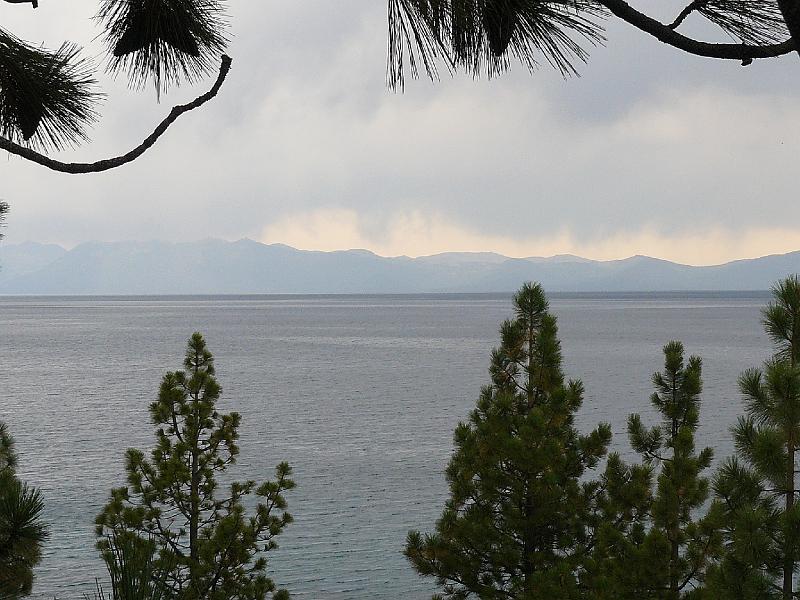 P1020392.JPG - We take a drive around the lake and watch the rain falling in the distance.