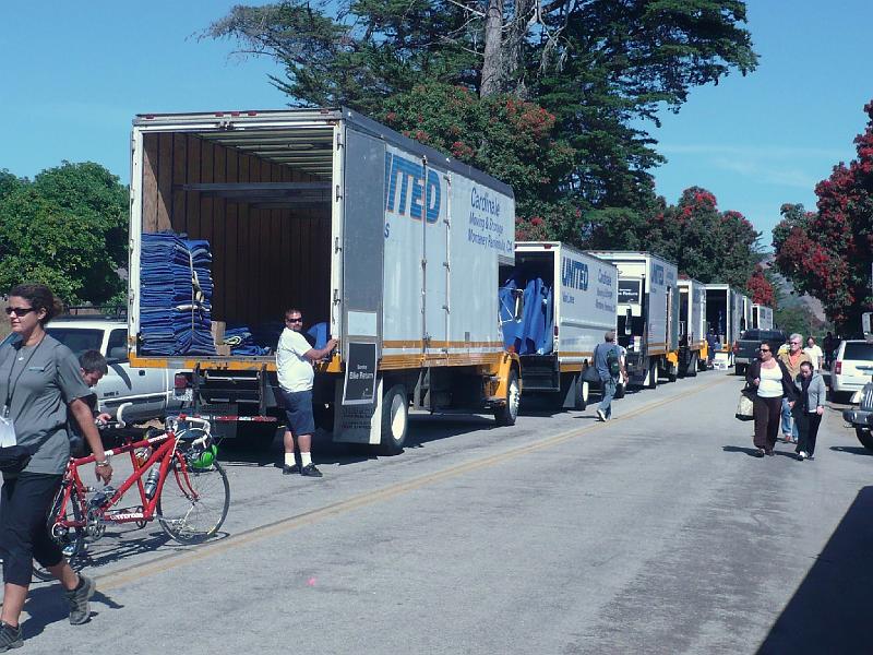 P1040727fix.JPG - Trucks to transport bikes back to where they need to be.